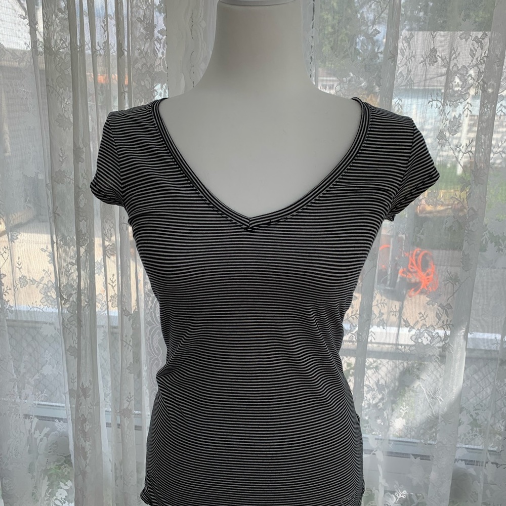 Guess Black and White striped tee with sparkle guess logo.